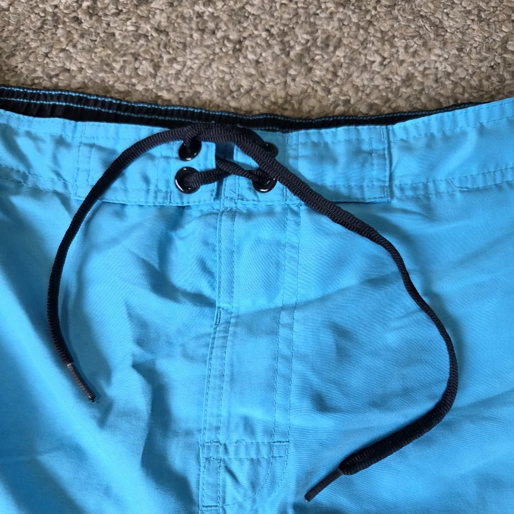 NIKE Swim Trunks Turquiose Blue Lined Spellout‎ Back Swoosh Mens SZ L